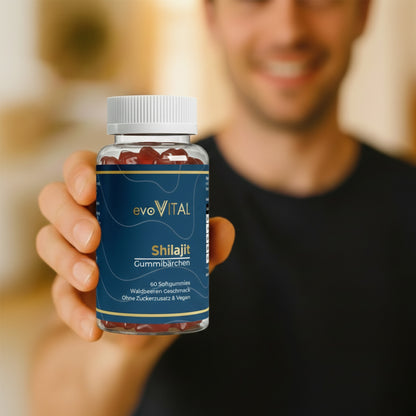 Eine Hand hält die Dose der Shilajit-Gummies mit Vitaminkomplex für Energiestoffwechsel, Nervensystem und Verringerung von Müdigkeit – 30 Portionen.